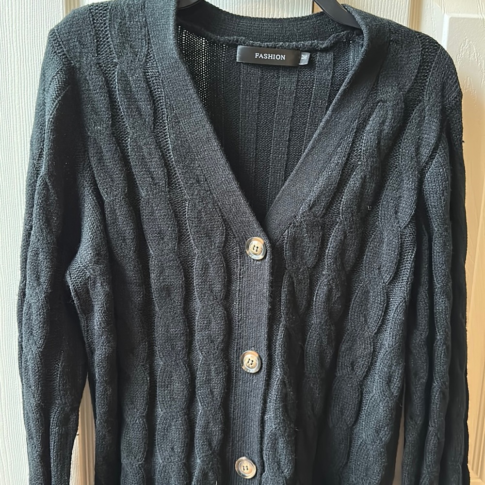 Black cable sweater